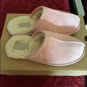 UGG Slippers practically new.